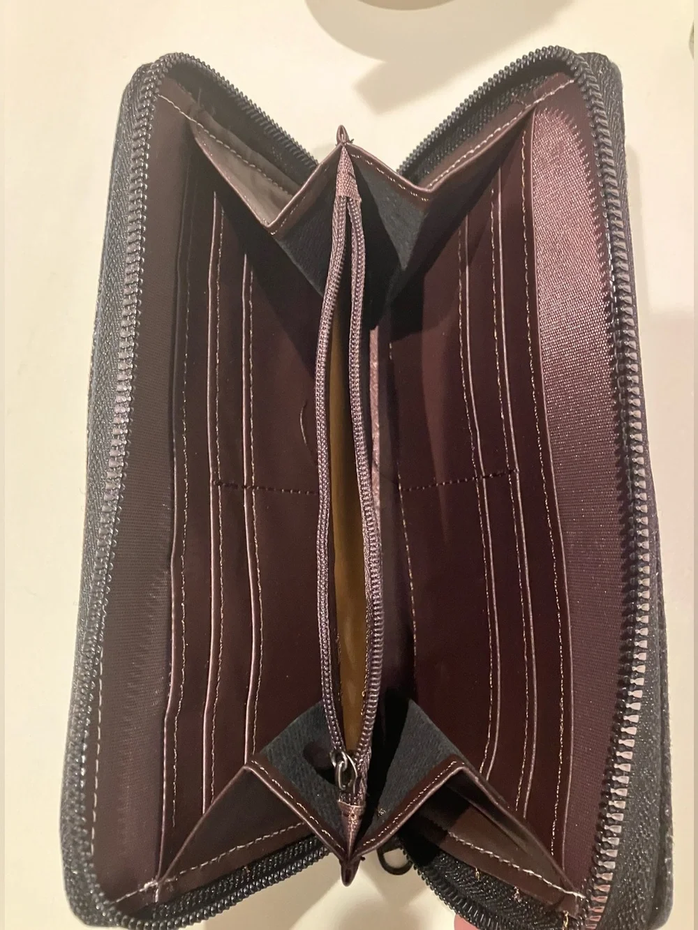 Western-themed zip-around wallet cowboy riding horse sunset